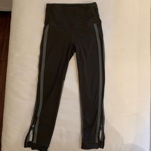 Lululemon  tights- army green- with green stripes /sides. Zipper bottoms